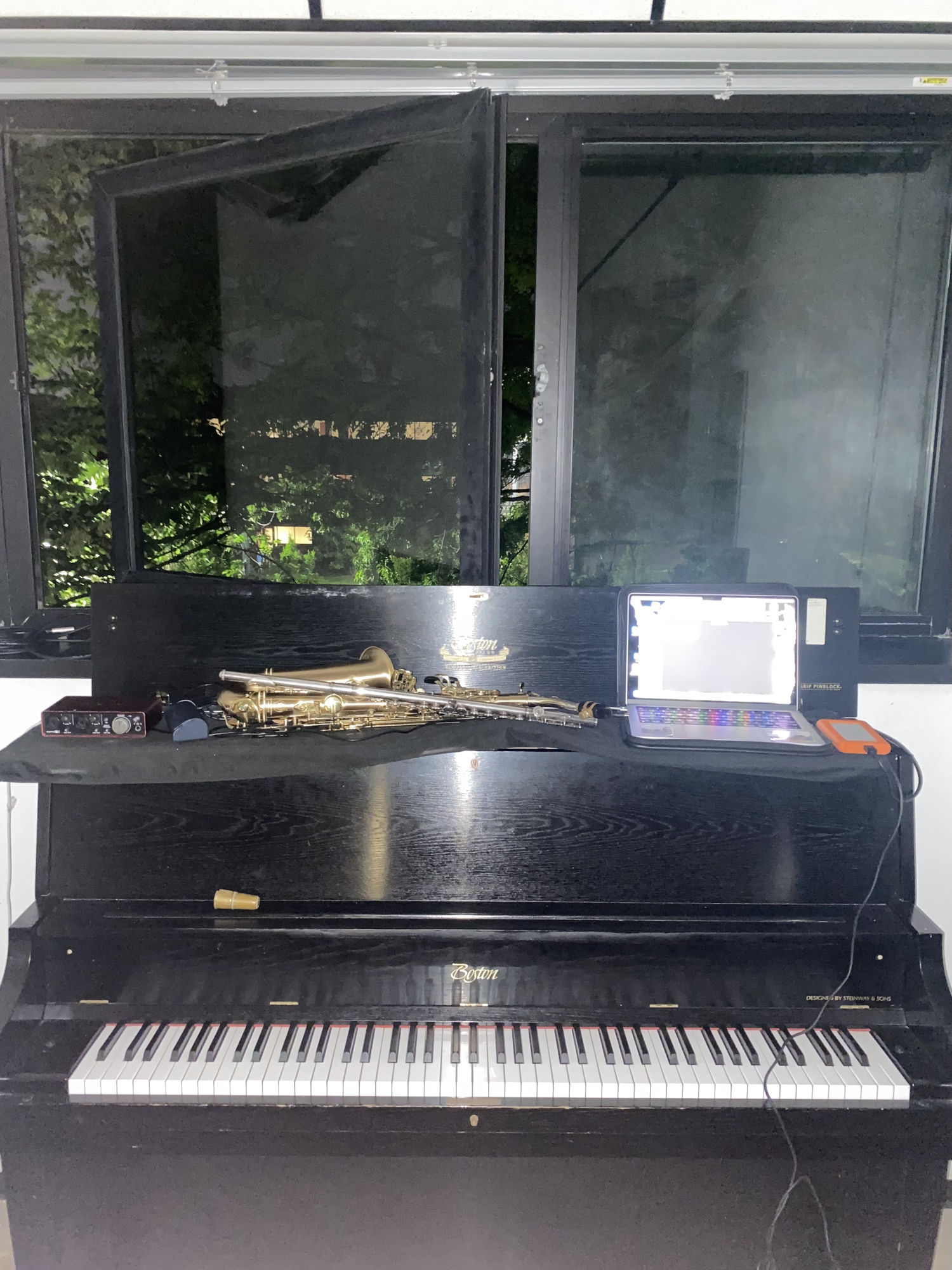 Boston piano with saxophone and brass instruments