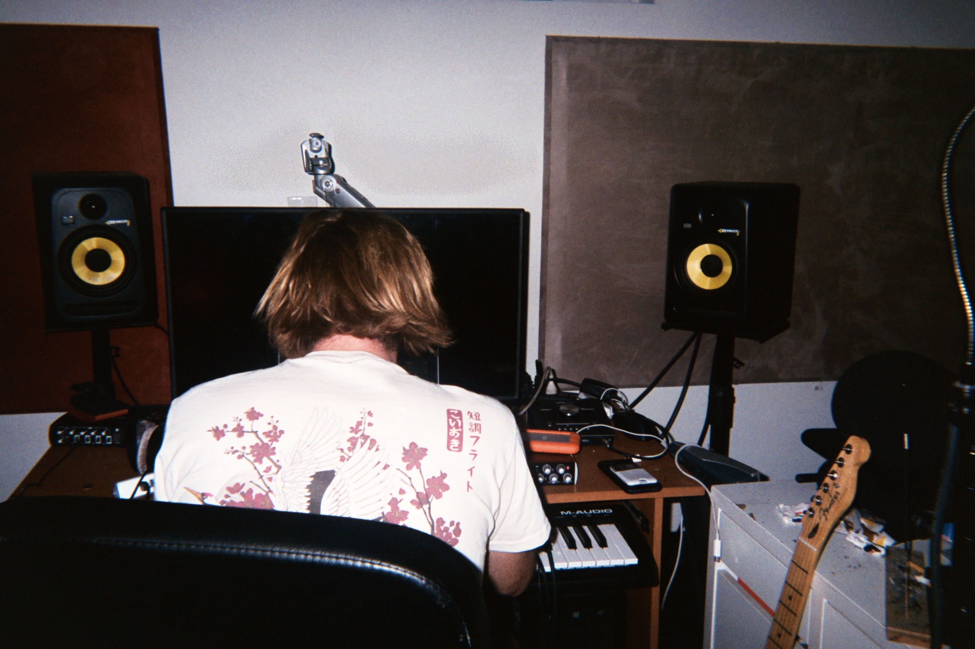 Producer at the desk with monitors